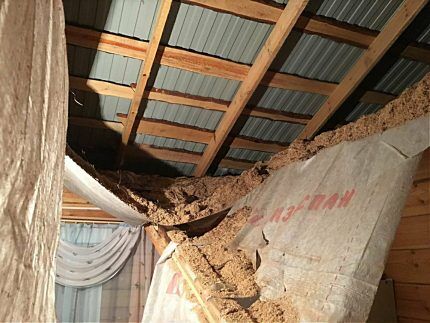 Collapsed insulated ceiling in a house