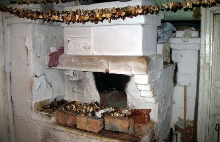 Drying mushrooms on a Russian oven
