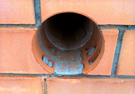 Hole in a brick wall for a gas pipe