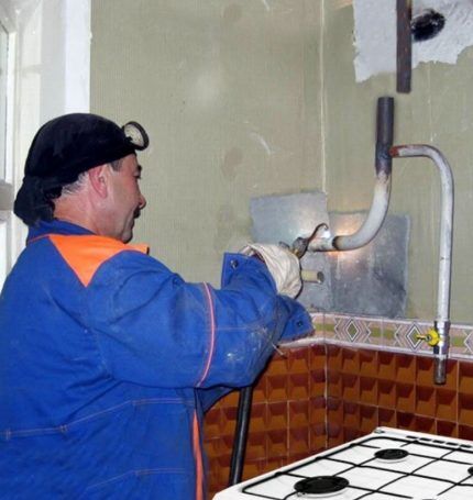 Master welding a gas pipe