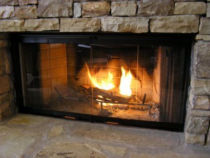 Glass door gas fireplace