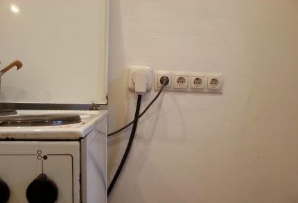 The electric stove is connected to the outlet