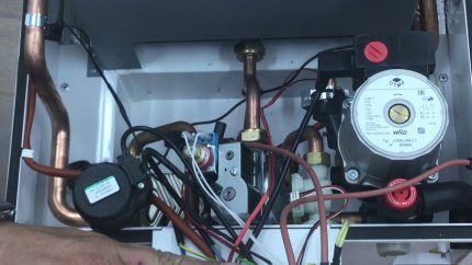 Lemax wall-mounted boiler disassembled