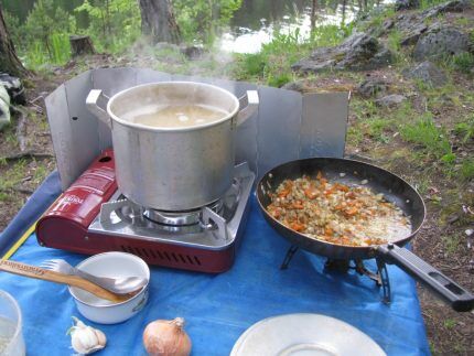 Cooking while camping on a camping gas stove