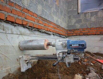 Drilling the foundation for the ventilation hole