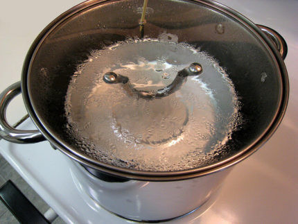 Distilling water in a saucepan