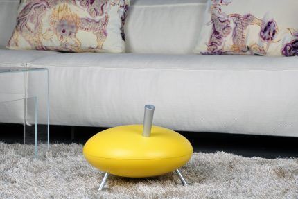 Yellow humidifier on carpet