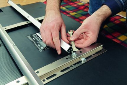 Attaching bolts to the TV case