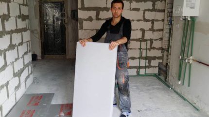 Worker with foam sheets