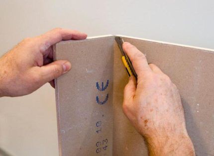 Cutting drywall with a knife