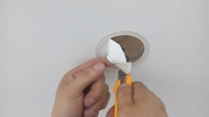 The process of cutting out the film inside the ring