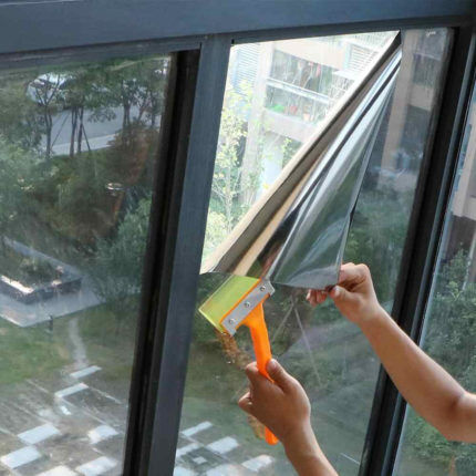 Applying film to a window