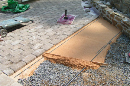 Base for paving slabs