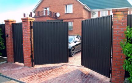 Swing gates with brick pillars