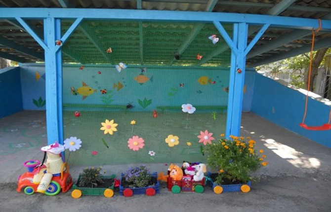 Decorating a site in a kindergarten with your own hands: materials, design options