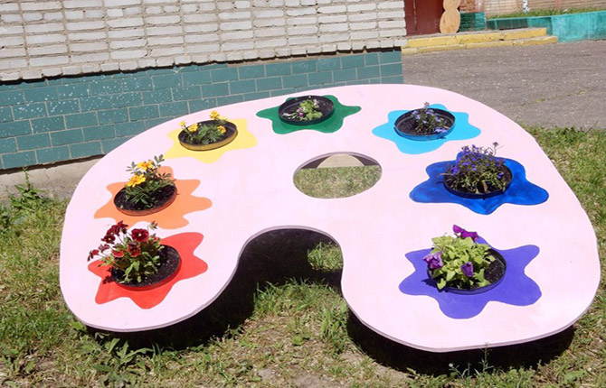 Decorating a site in a kindergarten with your own hands: materials, design options