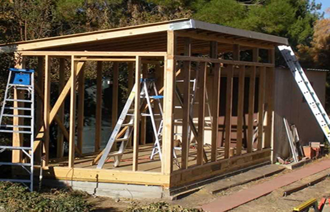 The chicken coop box is assembled from pine beams and boards
